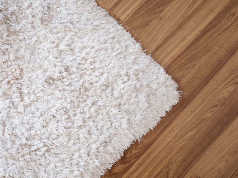 Rug on Hardwood Floor